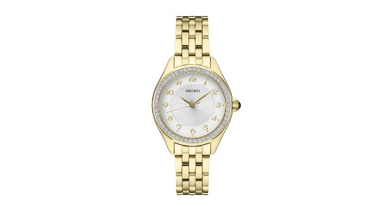 a yellow gold watch with a white dial and diamond studded bezel