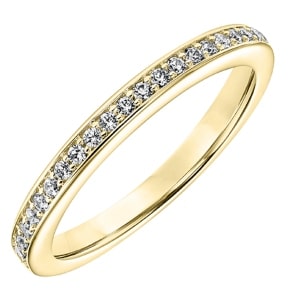 A yellow gold diamond anniversary band from Goldman.