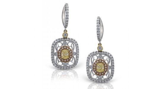 a mixed metal pair of vintage-inspired earrings by Simon G.