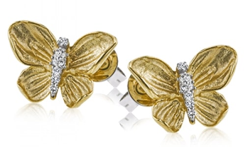 A pair of butterfly stud earrings from Simon G.