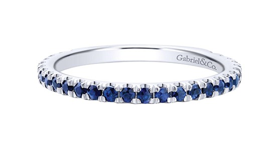 a silver stacking ring with sapphires by Gabriel & Co.
