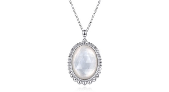 a white gold pendant necklace featuring pearl overlaid with clear quarts