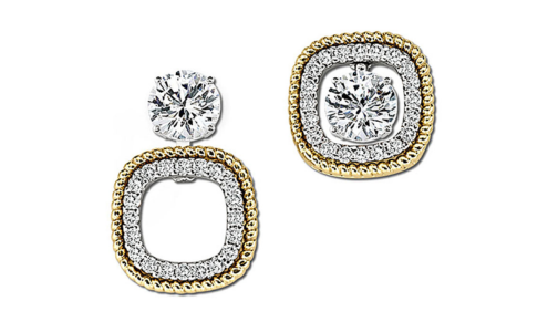 A pair of two-tone Uneek earring jackets with diamond accents, with one empty and the other with a diamond stud earring at its center, available at Bob Richards Jewelers. A pair of two-tone Uneek earring jackets with diamond accents, with one empty and the other with a diamond stud earring at its center, available at Bob Richards Jewelers.